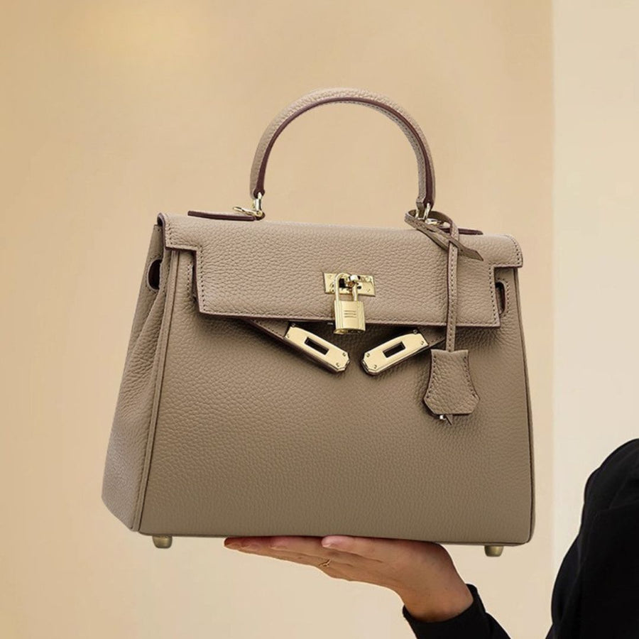 Ivory Crest Handbag